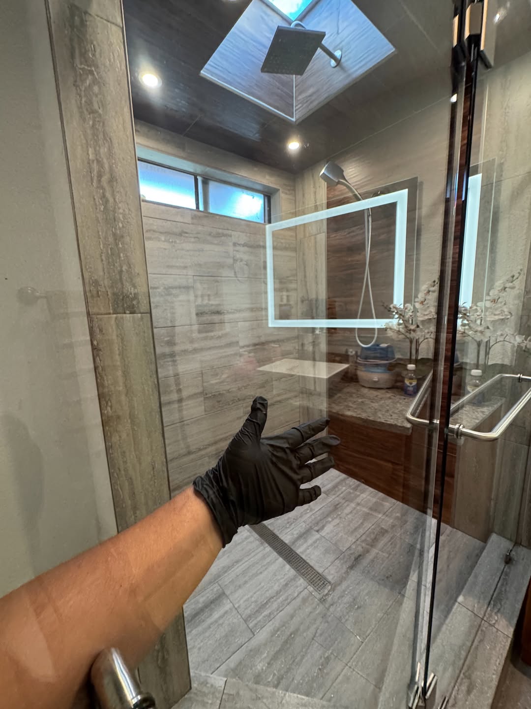 Spotless clean glass shower door detail